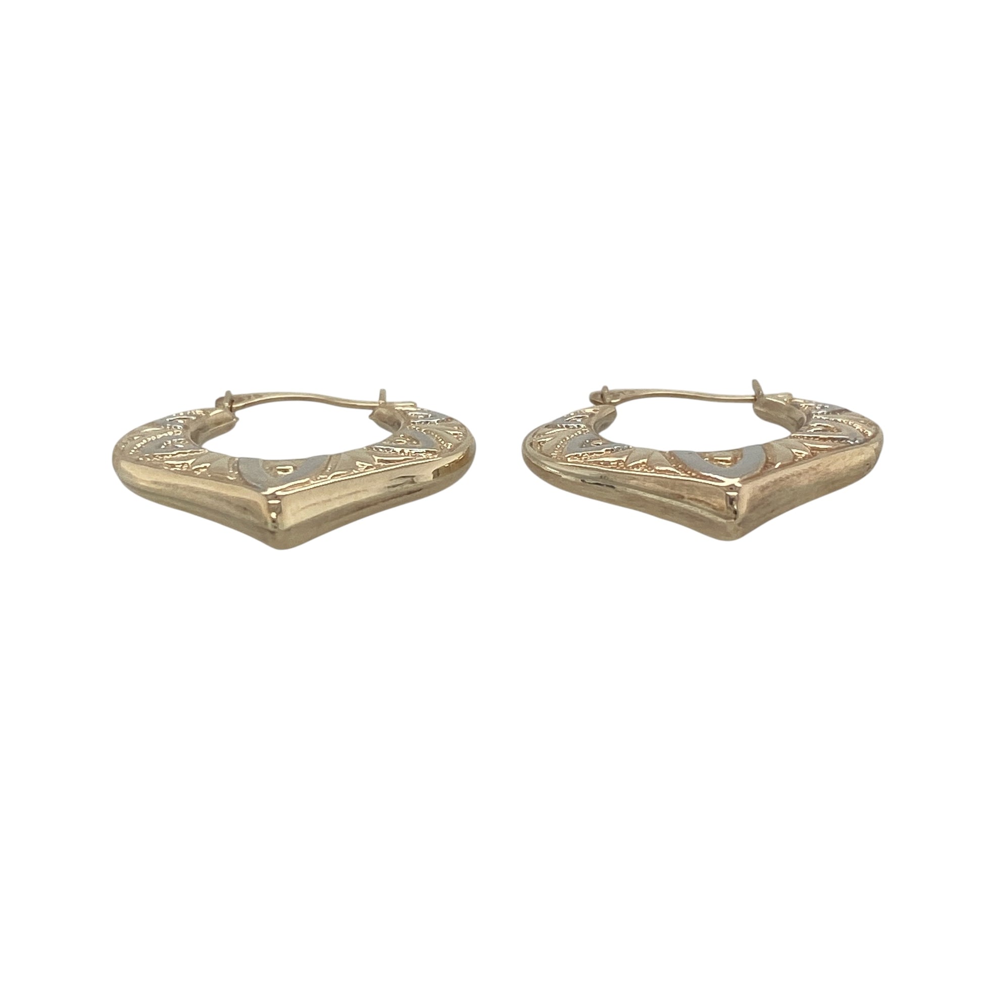 Delicate and stylish, these pre-owned 9ct yellow and white gold patterned heart creole earrings beautifully combine two-tone gold with a romantic heart-shaped design. Their elegant detailing and lightweight feel make them a charming addition to any jewellery collection.

Design: The earrings feature a graceful heart-shaped creole design enhanced with an attractive patterned finish.