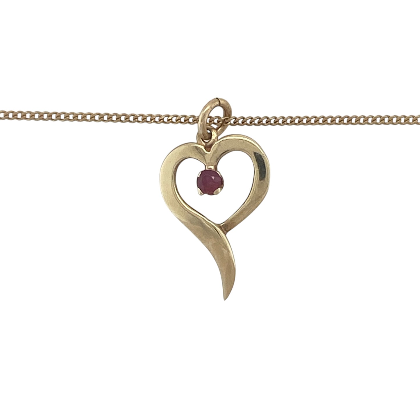 Romantic and elegant, this pre-owned 9ct yellow gold ruby open heart pendant necklace beautifully combines the timeless symbol of love with the rich colour of a natural ruby. Its graceful design makes it a meaningful piece for everyday wear or a thoughtful gift for someone special.

Design: The necklace features an elegant open heart pendant measuring approximately 2.2cm in length, including the bail.