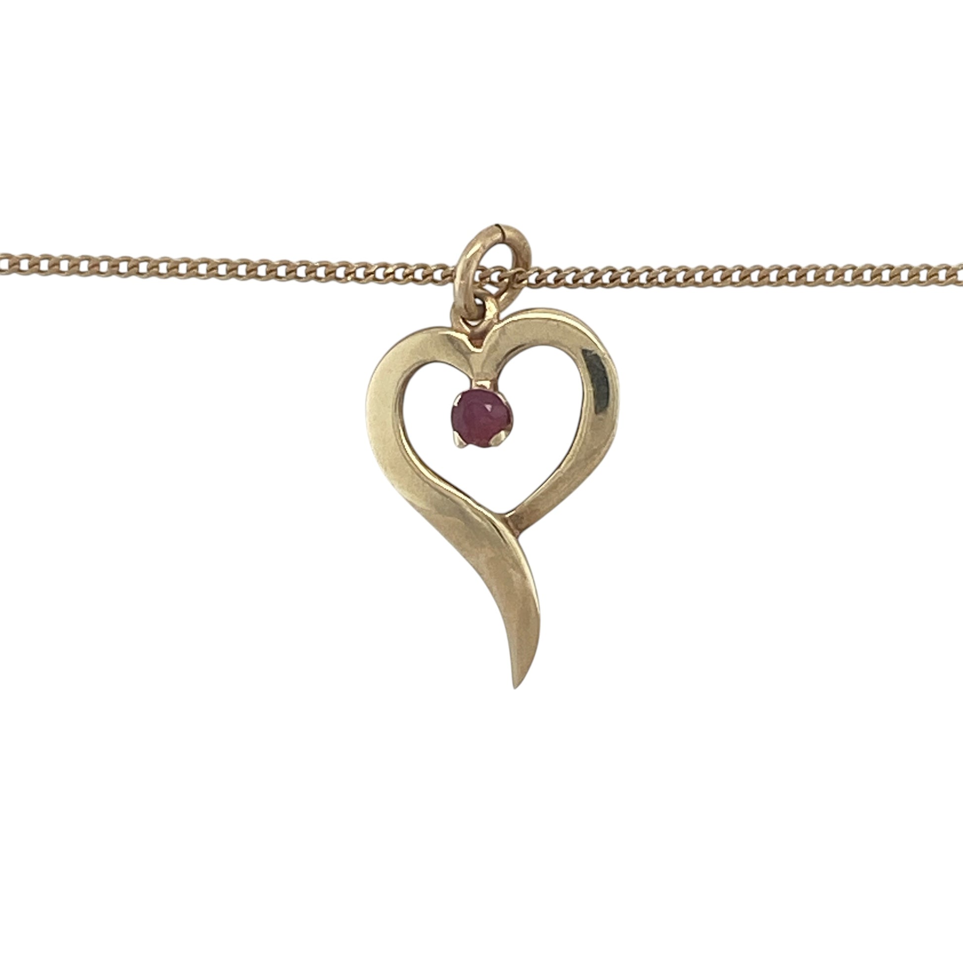 Romantic and elegant, this pre-owned 9ct yellow gold ruby open heart pendant necklace beautifully combines the timeless symbol of love with the rich colour of a natural ruby. Its graceful design makes it a meaningful piece for everyday wear or a thoughtful gift for someone special.

Design: The necklace features an elegant open heart pendant measuring approximately 2.2cm in length, including the bail.