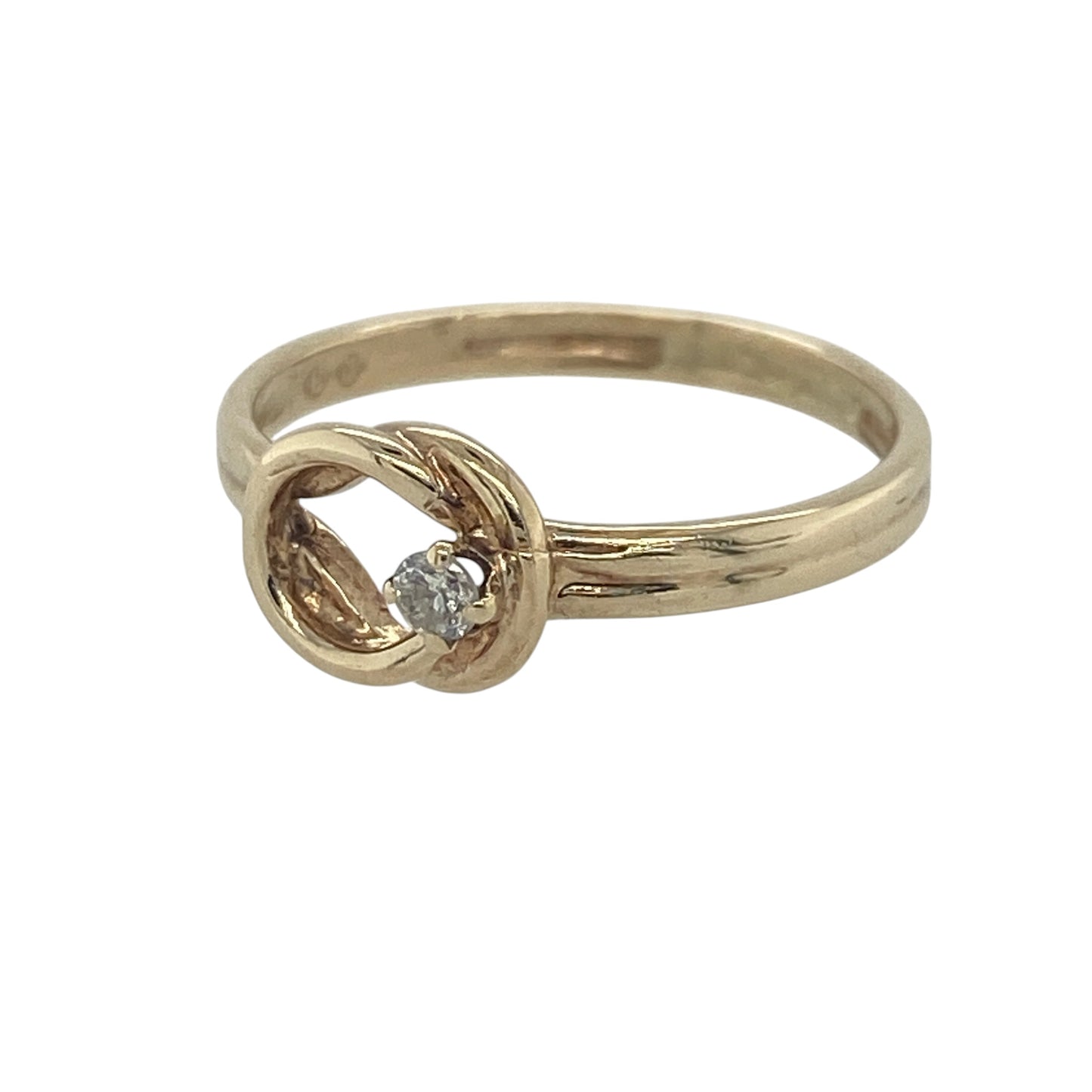 Elegant and symbolic, this pre-owned 9ct yellow gold diamond open knot ring beautifully combines timeless design with delicate sparkle. The graceful open knot motif represents unity, love, and everlasting connection, making it a meaningful addition to any jewellery collection.

Design: The ring features an attractive open knot design, creating a flowing and elegant silhouette. Measuring approximately 7mm in height across the front, the knot forms a graceful focal point that is both refined and eye-catching.