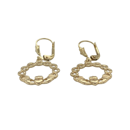 Celebrate Celtic heritage with these beautiful pre-owned 14ct yellow gold round Celtic weave Claddagh drop earrings. Combining the iconic Claddagh symbol with an intricate Celtic weave design, these elegant earrings are rich in tradition and timeless style, making them a meaningful addition to any jewellery collection.

Design: The earrings feature a graceful round drop design incorporating an intricate Celtic weave surrounding the traditional Claddagh motif.