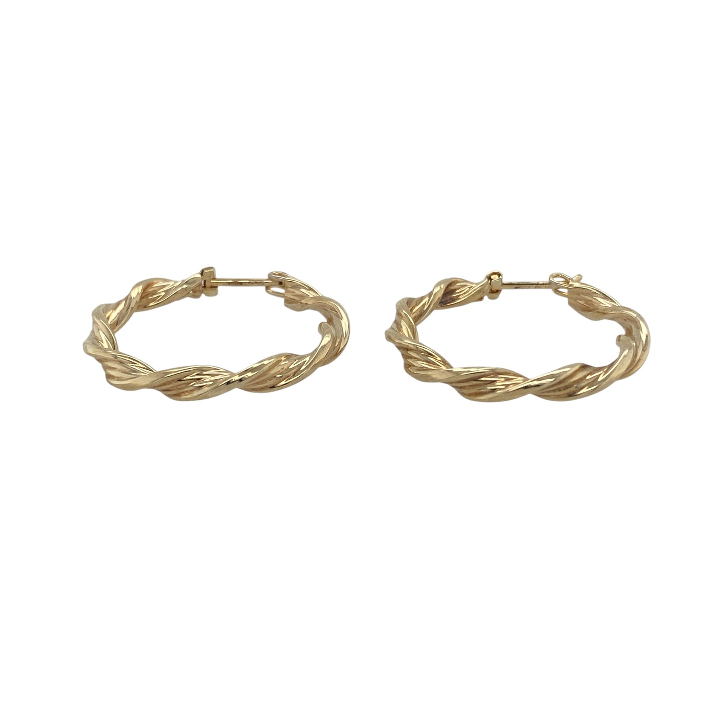 Classic with a contemporary twist, these pre-owned 9ct yellow gold twisted hoop creole earrings are a timeless jewellery essential. Their elegant twisted profile adds texture and light-catching detail to the traditional hoop design, making them a versatile choice for both everyday wear and special occasions.

Design: The earrings feature a classic hoop creole silhouette with a beautifully twisted finish that creates added depth and visual interes.