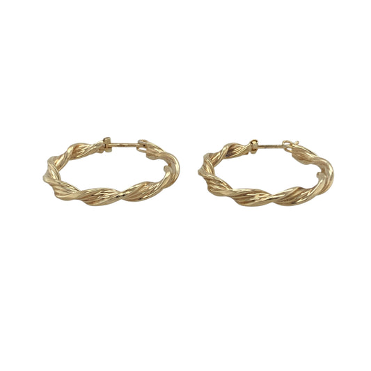 Classic with a contemporary twist, these pre-owned 9ct yellow gold twisted hoop creole earrings are a timeless jewellery essential. Their elegant twisted profile adds texture and light-catching detail to the traditional hoop design, making them a versatile choice for both everyday wear and special occasions.

Design: The earrings feature a classic hoop creole silhouette with a beautifully twisted finish that creates added depth and visual interes.