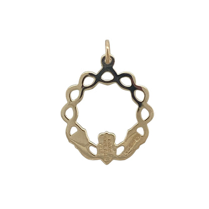 Celebrate Irish heritage and timeless craftsmanship with this beautiful pre-owned 14ct yellow gold Celtic weave round Claddagh pendant. Combining the iconic Claddagh symbol with an intricate Celtic weave surround, this elegant pendant carries a rich tradition of love, loyalty, and friendship.

Design: The pendant features a beautifully crafted round design incorporating the traditional Claddagh motif, framed by an intricate Celtic weave border.