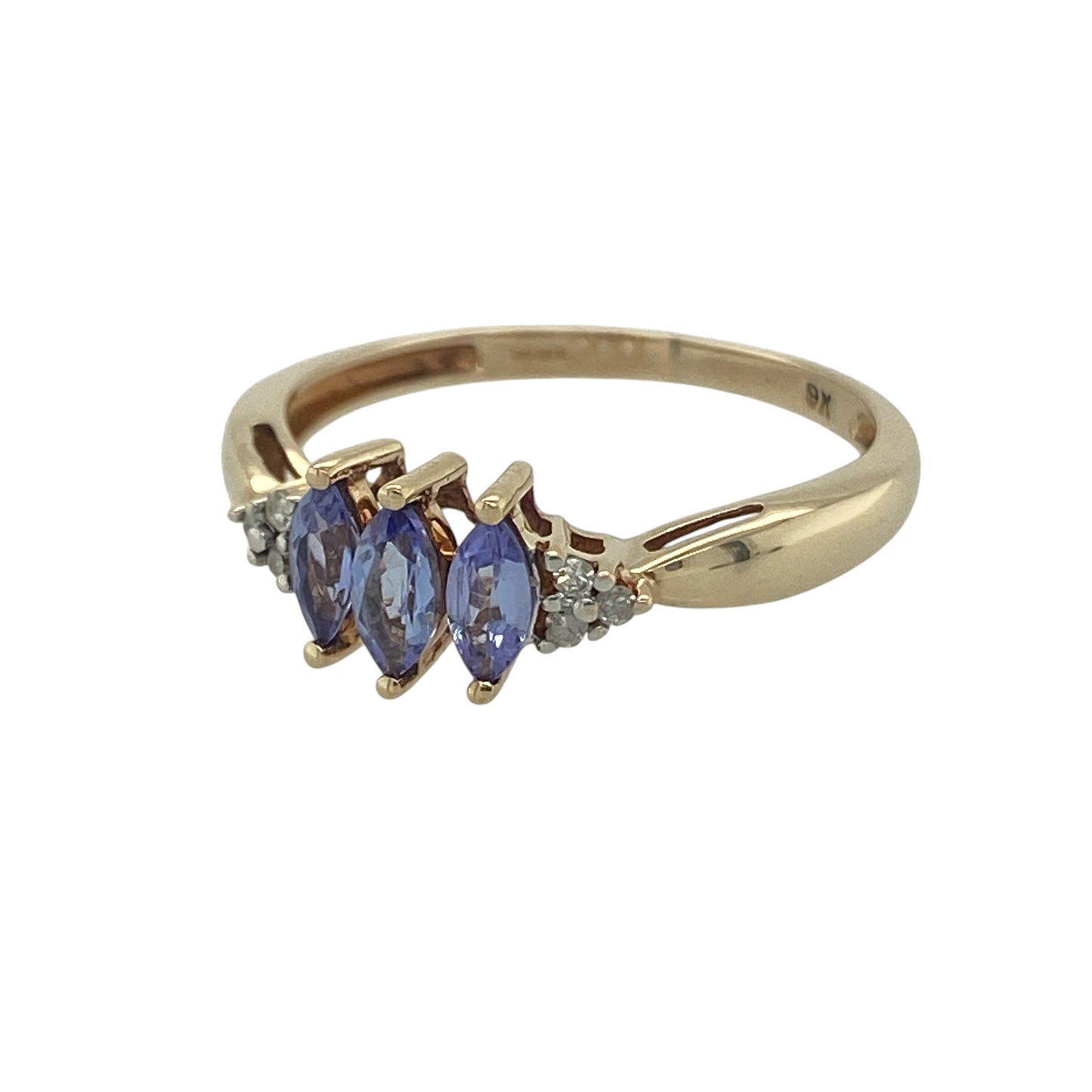 Graceful and elegant, this pre-owned 9ct yellow gold diamond and tanzanite trilogy ring beautifully showcases the captivating violet-blue hues of tanzanite alongside sparkling diamond clusters. The timeless trilogy design symbolises the past, present, and future, making it a meaningful piece for a special celebration or a treasured addition to any jewellery collection.

Design: The ring features a classic trilogy arrangement of three marquise-cut tanzanites
