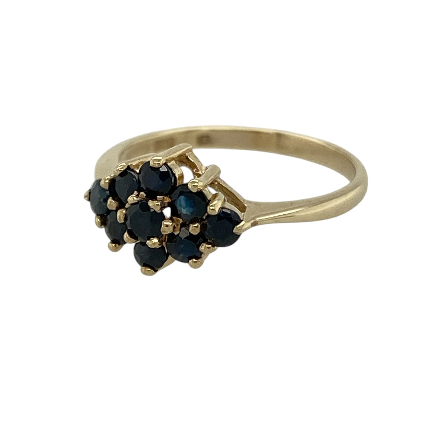 Bring timeless elegance and vibrant colour to your jewellery collection with this pre-owned 9ct yellow gold diamond-shaped sapphire cluster ring, featuring a classic cluster design that adds sophistication to both everyday wear and special occasions.

Design: The ring showcases a striking diamond-shaped cluster of rich blue sapphires, creating an elegant focal point. Measuring approximately 7mm high, the beautifully proportioned cluster offers a refined yet eye-catching look.