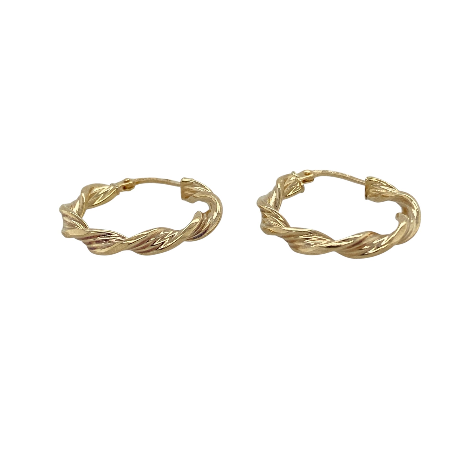 Add timeless style to your jewellery collection with these pre-owned 9ct yellow gold twisted hoop Creole earrings, featuring an elegant twisted design that offers a modern take on a classic hoop—perfect for everyday wear or dressing up any outfit.

Design: The earrings feature a traditional Creole hoop shape with an attractive twisted finish, creating added texture and light-catching detail for a stylish and versatile look.