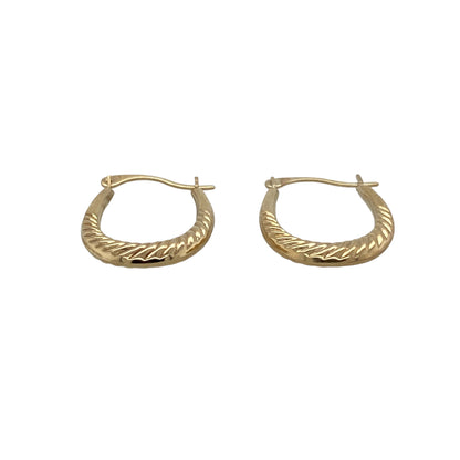Add elegant simplicity to your jewellery collection with these pre-owned 9ct yellow gold twisted oval Creole earrings, featuring a graceful oval shape with a stylish twisted finish that complements both everyday and occasion wear.

Design: The earrings feature a classic oval Creole hoop design enhanced by a delicate twisted pattern, creating extra texture and a subtle light-catching effect for a refined, contemporary look.