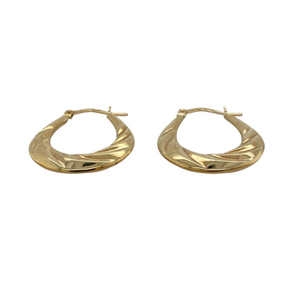 Add elegant simplicity to your jewellery collection with these pre-owned 9ct yellow gold twisted oval Creole earrings, featuring a graceful oval shape with a stylish twisted finish that complements both everyday wear and special occasions.

Design: The earrings feature a classic oval Creole hoop design with an attractive twisted pattern, creating subtle texture and a light-catching finish that enhances their timeless appeal.
