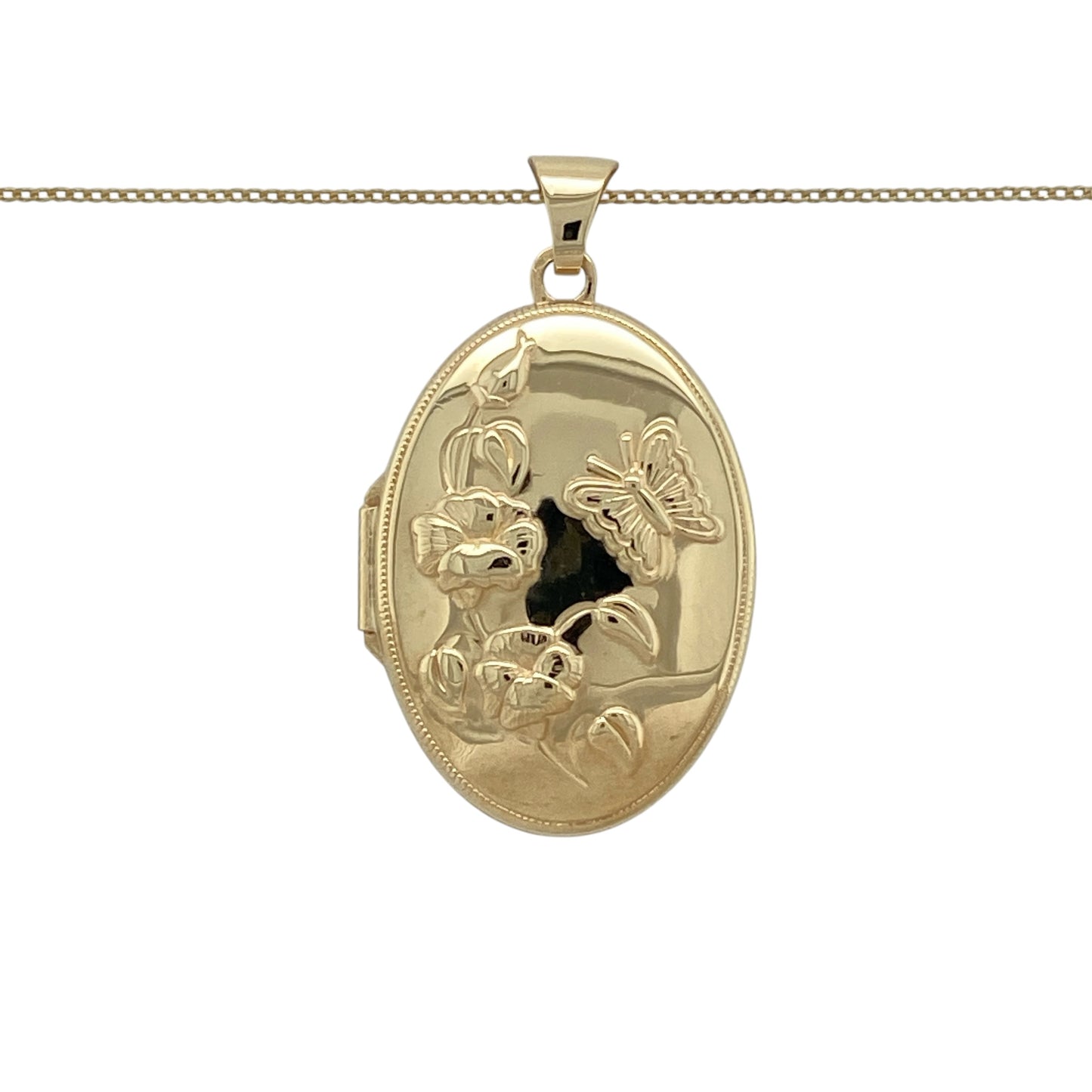 Keep treasured memories close with this pre-owned 9ct yellow gold oval flower and butterfly locket necklace, featuring a beautifully detailed design suspended from a classic 20-inch fine curb chain.

Design: The necklace features an elegant oval locket decorated with delicate flower and butterfly detailing, creating a timeless and sentimental piece. Measuring approximately 3.4cm long including the bail, the locket makes a graceful statement while offering space inside for cherished photographs or keepsakes.