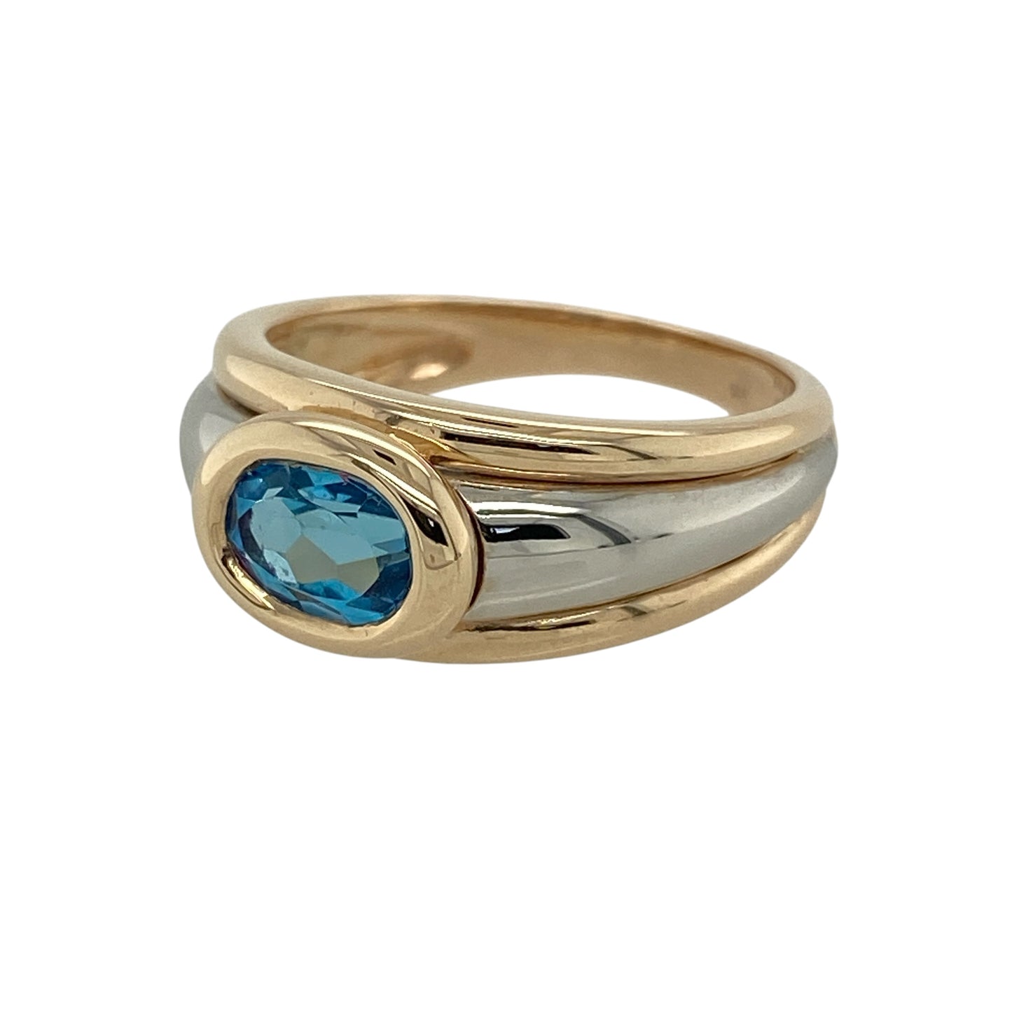 Add elegant colour and timeless style to your jewellery collection with this pre-owned 9ct yellow and white gold blue topaz ring, featuring a beautiful oval-cut gemstone in a classic two-tone design—perfect for everyday wear or special occasions.

Design: The ring showcases a stunning oval-cut blue topaz measuring approximately 7mm by 5mm, creating a vibrant focal point with its refreshing sky-blue colour.
