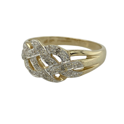 Celebrate timeless heritage and elegant sparkle with this pre-owned 9ct yellow and white gold diamond Celtic knot ring, featuring an intricate Celtic-inspired design with diamond accents—perfect for everyday wear or as a meaningful gift.

Design: The ring showcases an elegant Celtic knot design across the front, measuring approximately 9mm high. The flowing interwoven pattern is enhanced with sparkling diamonds and contrasting yellow and white gold, creating a distinctive and eye-catching look.