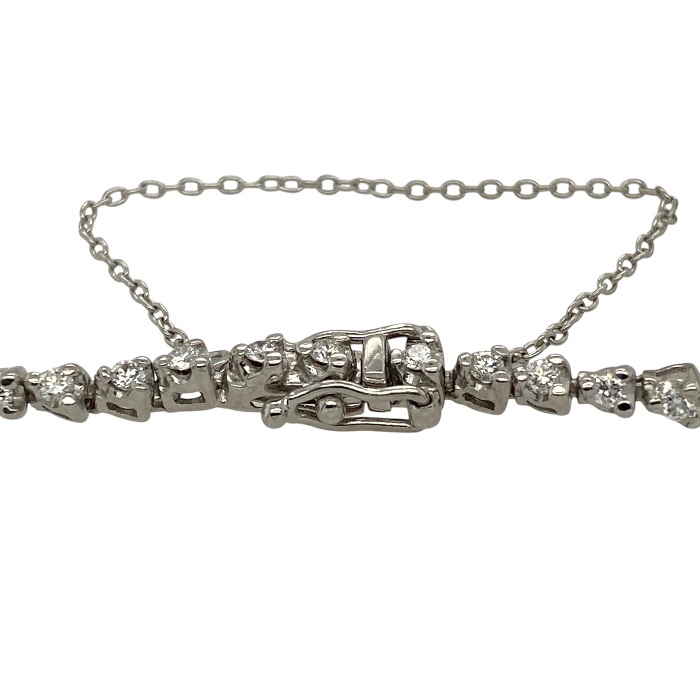 Add timeless luxury to your jewellery collection with this pre-owned 18ct white gold diamond tennis style bracelet, featuring a continuous row of brilliant-cut diamonds that deliver exceptional sparkle and elegance—perfect for special occasions or sophisticated everyday wear.

Design: The bracelet showcases a classic 7.25-inch tennis style design with approximately 62 brilliant-cut diamonds, creating an elegant line of continuous sparkle.