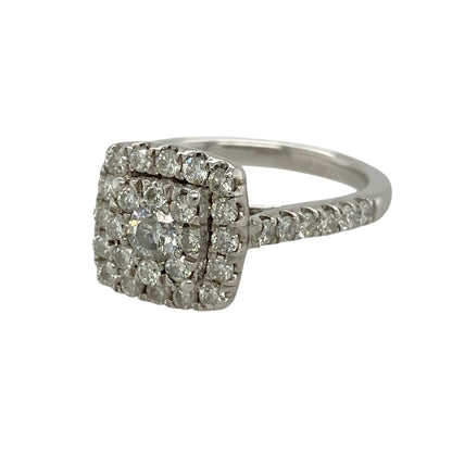 Add exceptional sparkle to your jewellery collection with this pre-owned 9ct white gold diamond halo cluster ring, featuring an impressive halo design with approximately 1ct of total diamond content—perfect for special occasions or luxurious everyday wear.

Design: The ring showcases a striking halo cluster design measuring approximately 11mm across the front, creating a dazzling display of brilliance.