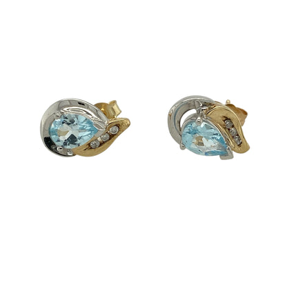Add elegant sparkle and vibrant colour to your jewellery collection with these pre-owned 9ct yellow and white gold diamond and blue topaz teardrop stud earrings, featuring stunning blue topaz gemstones complemented by sparkling diamond accents.

Design: The earrings showcase beautiful teardrop-shaped blue topaz gemstones, each measuring approximately 7mm by 5mm.