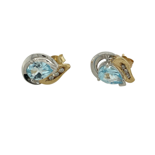 Add elegant sparkle and vibrant colour to your jewellery collection with these pre-owned 9ct yellow and white gold diamond and blue topaz teardrop stud earrings, featuring stunning blue topaz gemstones complemented by sparkling diamond accents.

Design: The earrings showcase beautiful teardrop-shaped blue topaz gemstones, each measuring approximately 7mm by 5mm.