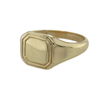 Make a timeless statement with this pre-owned 9ct yellow gold square signet ring, featuring a classic polished design that is perfect for everyday wear or personal engraving.

Design: The ring features a traditional square signet face measuring approximately 9mm high, offering a bold yet refined appearance. Its smooth, polished surface provides a timeless look and is ideal for leaving plain or adding a personalised engraved monogram or crest.