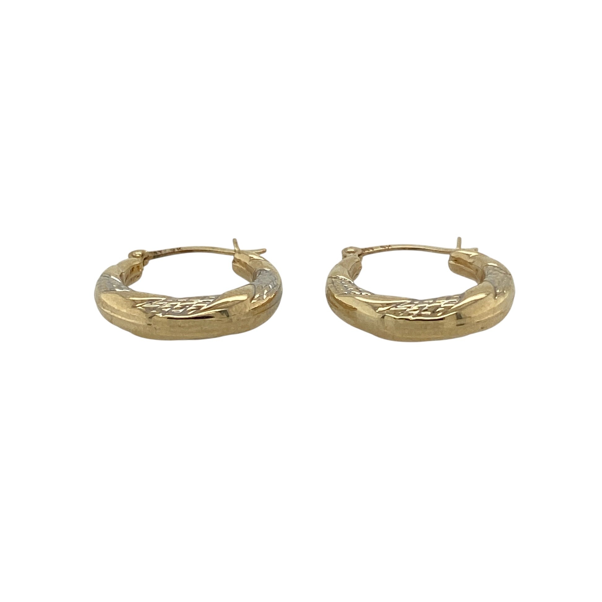 Add subtle elegance to your jewellery collection with these pre-owned 9ct yellow and white gold twist patterned hoop creole earrings, featuring a stylish two-tone design that is perfect for everyday wear.

Design: These earrings feature a classic hoop creole style with an elegant twisted pattern that combines yellow and white gold for a beautifully contrasting finish.