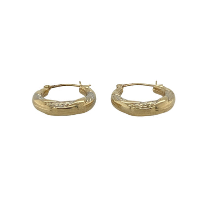 Add subtle elegance to your jewellery collection with these pre-owned 9ct yellow and white gold twist patterned hoop creole earrings, featuring a stylish two-tone design that is perfect for everyday wear.

Design: These earrings feature a classic hoop creole style with an elegant twisted pattern that combines yellow and white gold for a beautifully contrasting finish.