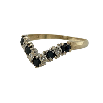 Add graceful elegance to your jewellery collection with this pre-owned 9ct yellow gold diamond and sapphire wishbone ring, featuring deep blue sapphires and sparkling diamond accents in a timeless wishbone design.

Design: The ring showcases a classic wishbone silhouette, beautifully set with rich blue sapphires measuring approximately 2mm in diameter, complemented by sparkling diamond accents.