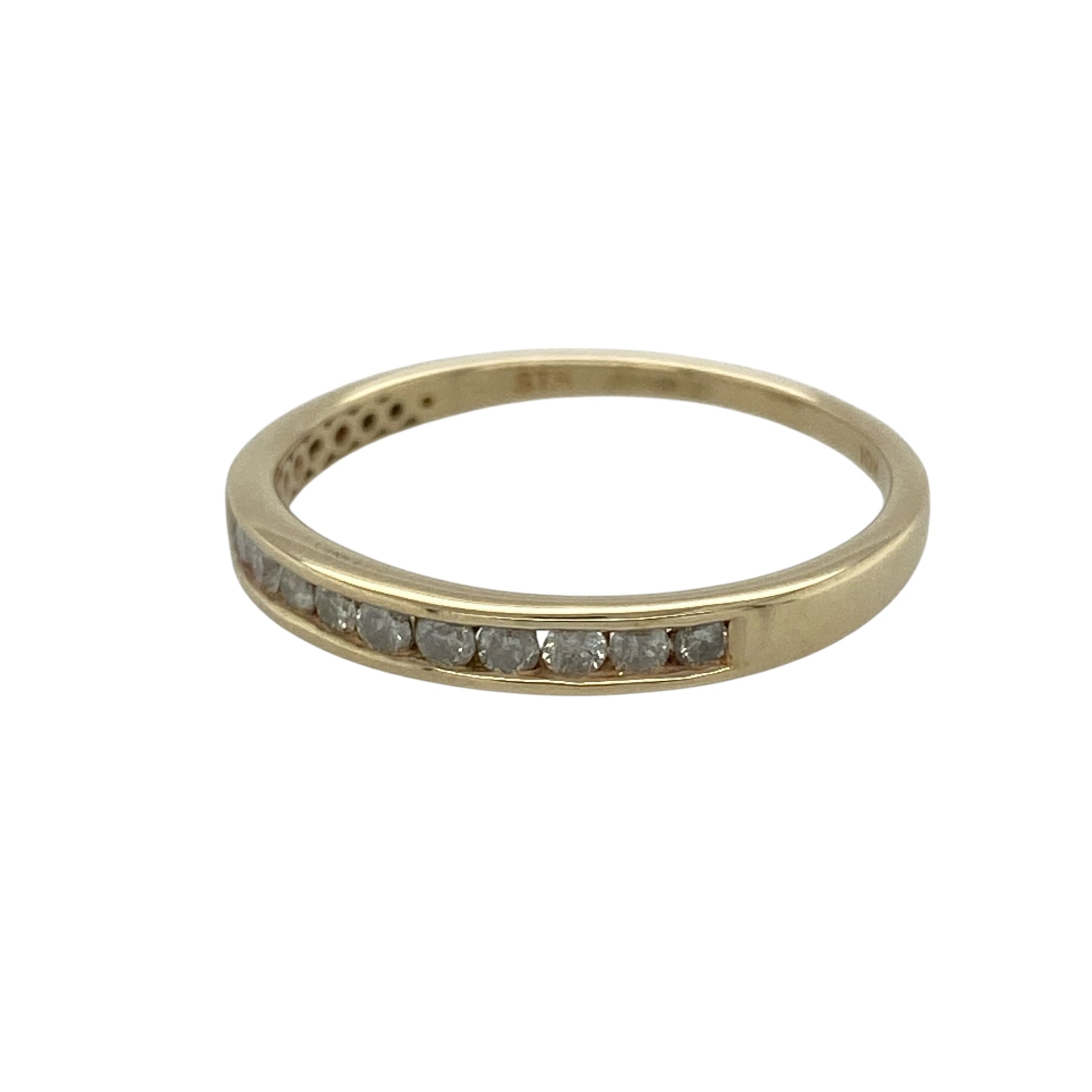 Add timeless sparkle to your jewellery collection with this pre-owned 9ct yellow gold diamond band ring, featuring a sleek design set with approximately 0.30ct of diamonds for elegant everyday wear or special occasions.

Design: The ring showcases a refined band with a front measuring approximately 3mm wide, beautifully set with sparkling diamonds that create a continuous line of brilliance across the finger.