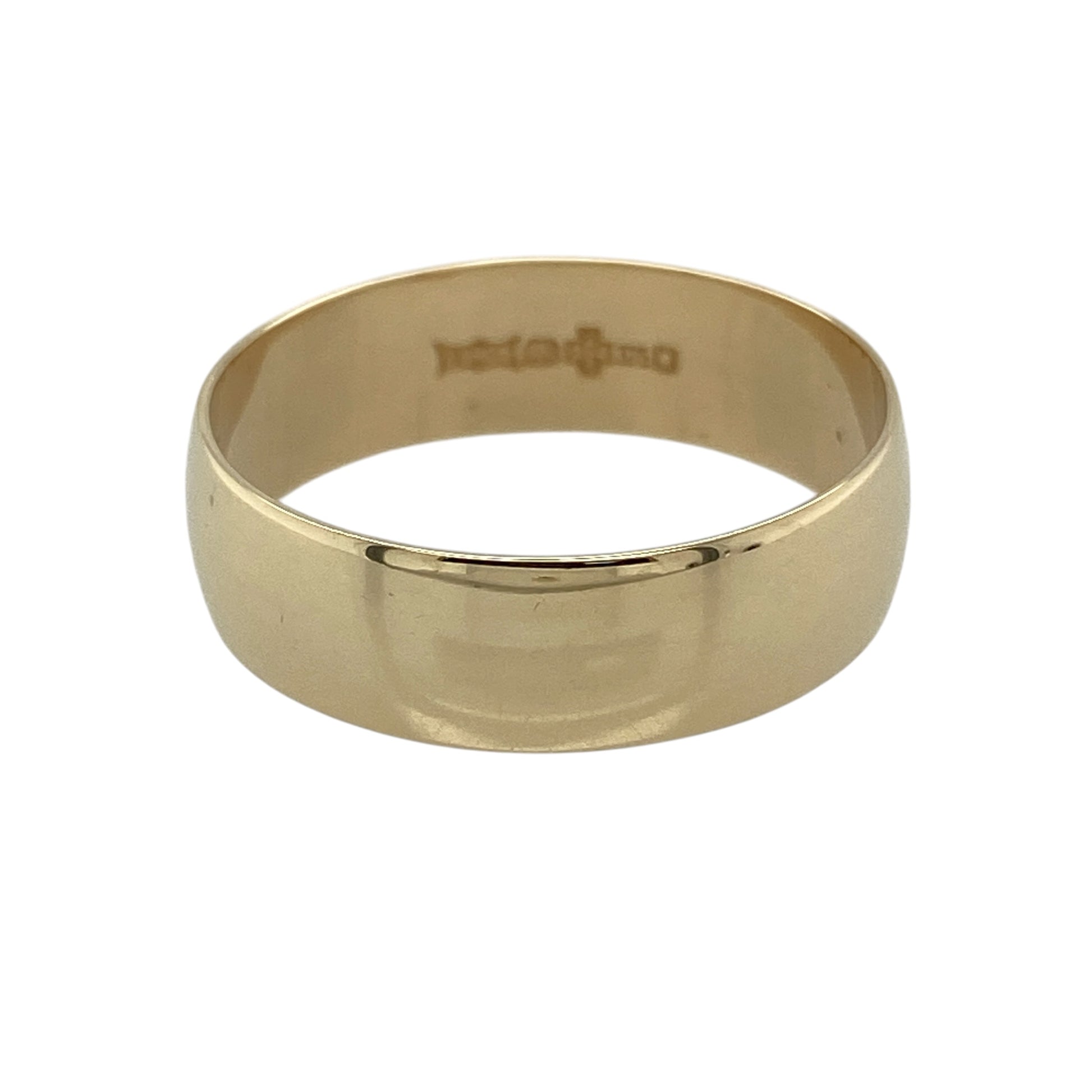 Celebrate timeless simplicity with this pre-owned 9ct yellow gold wedding band ring, featuring a classic 6mm polished profile that offers enduring style with a more substantial appearance.

Design: The ring features a traditional plain wedding band with a smooth, polished finish and a generous 6mm width. Its clean, understated design makes it a timeless choice, perfect as a wedding ring, commitment band or everyday accessory.
