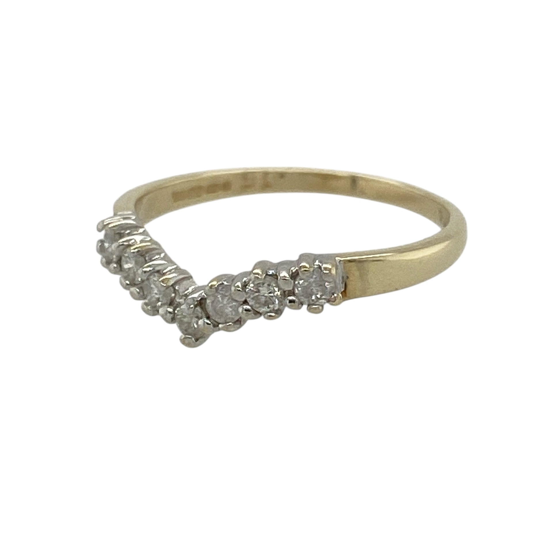 Add timeless elegance to your jewellery collection with this pre-owned 9ct yellow gold diamond wishbone ring, featuring a graceful V-shaped design accented with sparkling diamonds.

Design: The ring showcases a classic wishbone silhouette, beautifully enhanced with shimmering diamond accents that add subtle brilliance to the elegant design. The slim 2mm band creates a delicate and refined look, making it ideal for wearing alone, stacking with other rings or pairing with an engagement or wedding ring.