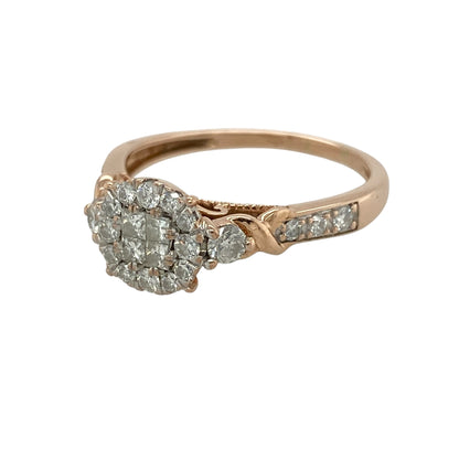 Add luxurious sparkle to your jewellery collection with this pre-owned 9ct rose gold diamond cluster ring, featuring an elegant cluster design with diamonds extending onto the shoulders for exceptional brilliance.

Design: The ring showcases a dazzling diamond cluster measuring approximately 8mm high across the front, creating an impressive display of sparkle. Additional diamonds set along the shoulders enhance the brilliance and give the ring a refined, elegant appearance from every angle.