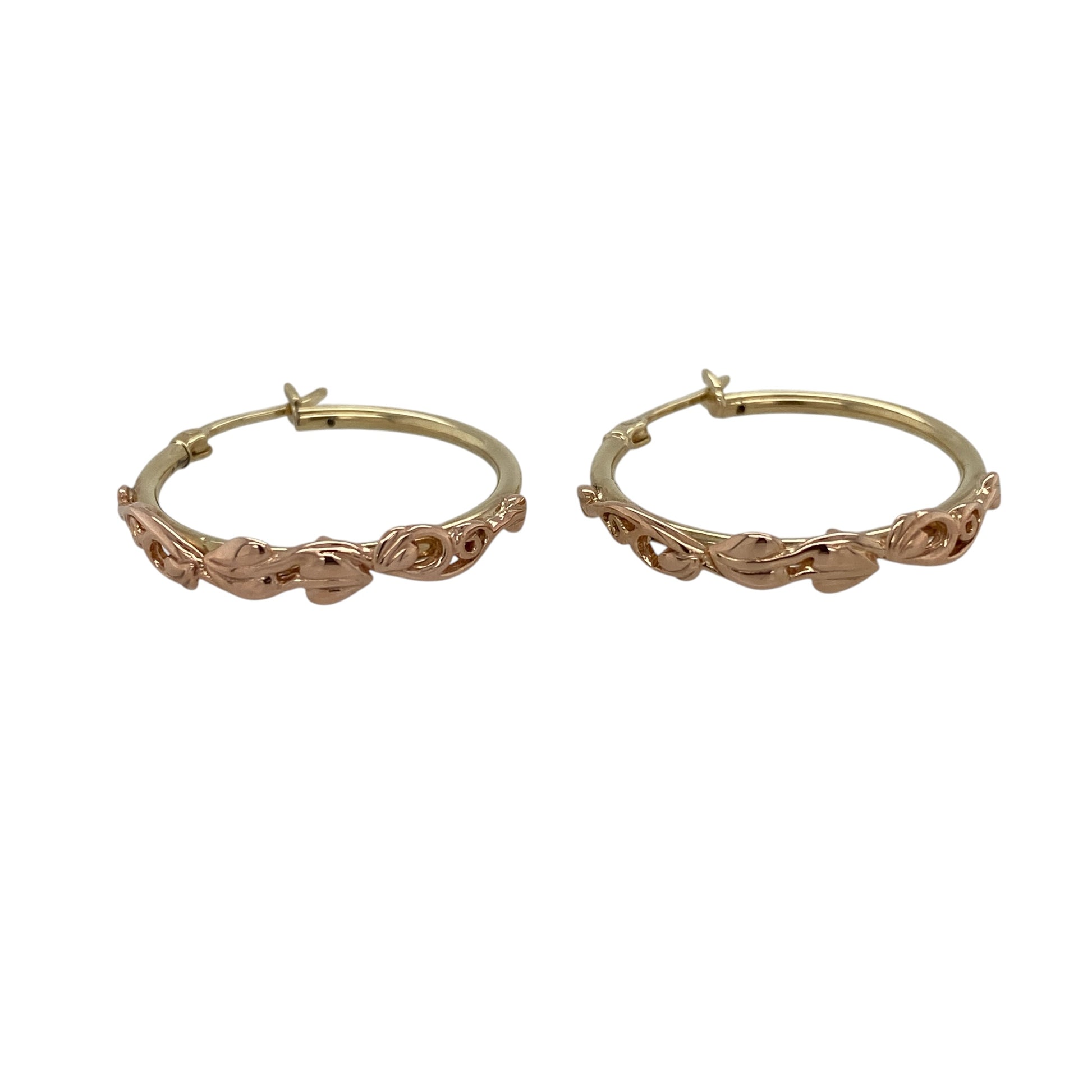 Celebrate Welsh heritage and timeless style with these pre-owned 9ct yellow and rose gold Clogau Tree of Life hoop creole earrings, featuring the iconic Tree of Life motif in an elegant two-tone design.

Design: These beautifully crafted hoop creole earrings feature Clogau's renowned Tree of Life design, with contrasting rose gold detailing set against polished yellow gold. The symbolic Tree of Life motif represents growth, strength and new beginnings, making these earrings both meaningful and stylish.