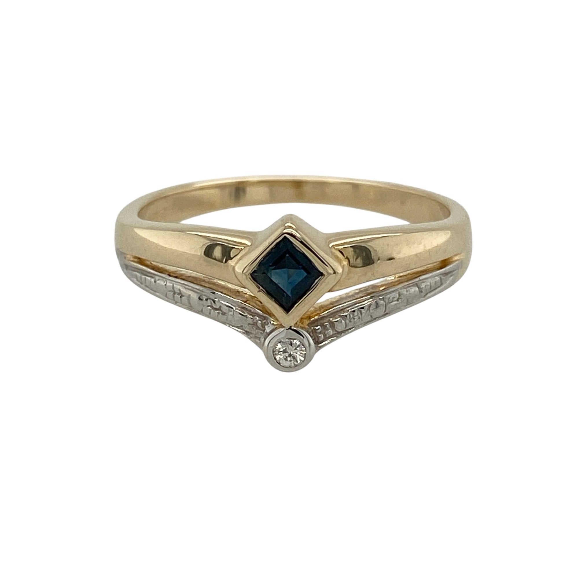 Add graceful elegance to your jewellery collection with this pre-owned 9ct yellow and white gold diamond and sapphire wishbone ring, featuring a delicate two-tone design centred around a vibrant square-cut sapphire.

Design: The ring showcases a classic wishbone silhouette, beautifully crafted in contrasting yellow and white gold. At the centre sits a striking square-cut sapphire measuring approximately 2mm by 2mm, complemented by sparkling diamond accents that enhance the elegant V-shaped design.