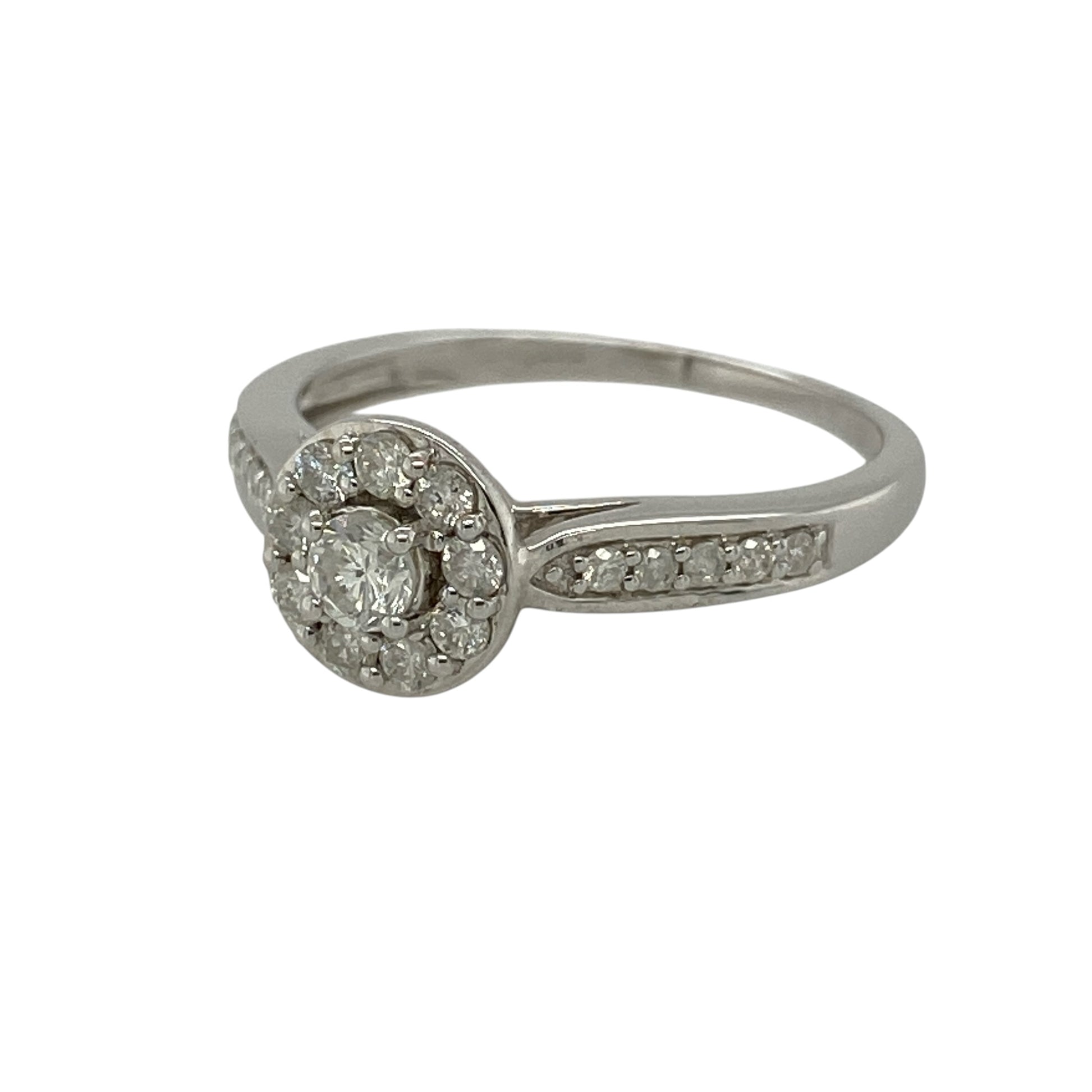Add timeless elegance to your jewellery collection with this pre-owned 9ct white gold diamond halo cluster ring, featuring a sparkling halo design with diamond-set shoulders for exceptional brilliance.

Design: The ring showcases a dazzling diamond cluster surrounded by a sparkling halo, creating the illusion of a larger centrepiece while maximising its brilliance.