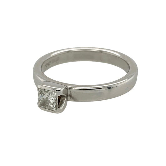 Experience timeless sophistication with this pre-owned 9ct white gold diamond solitaire ring, featuring a stunning princess-cut diamond in a classic setting that showcases its contemporary elegance.

Design: The ring is set with a beautiful princess-cut diamond weighing approximately 0.30ct. The clean geometric lines of the square-cut diamond create a modern yet timeless look, while the classic solitaire setting allows maximum light to enhance the stone's natural brilliance.
