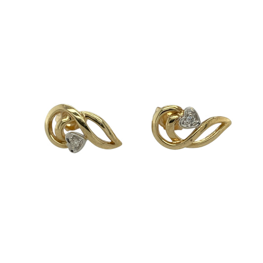 Add a touch of romance to your jewellery collection with these pre-owned 9ct yellow and white gold diamond heart swirl stud earrings, featuring an elegant two-tone heart design with sparkling diamond accents.

Design: These beautifully crafted stud earrings showcase an elegant heart motif with a graceful swirl design, combining polished yellow and white gold for a sophisticated two-tone finish. Sparkling diamond accents add a subtle touch of brilliance, enhancing the romantic and contemporary styling.
