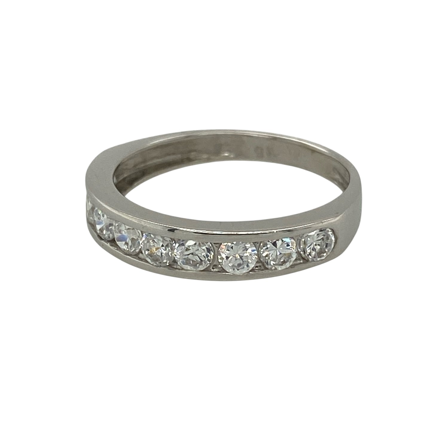 Add timeless sparkle to your jewellery collection with this pre-owned 9ct white gold cubic zirconia band ring, featuring a classic design set with shimmering round stones.

Design: This elegant band ring is set with a row of sparkling round cubic zirconia stones, each measuring approximately 3mm in diameter. The clean, timeless design offers plenty of brilliance while remaining refined enough for everyday wear or special occasions.