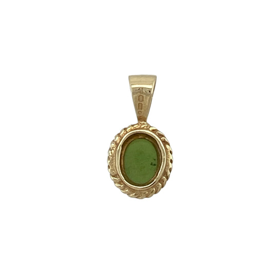 Add a touch of timeless elegance to your jewellery collection with this pre-owned 9ct yellow gold green stone pendant, featuring a beautifully proportioned oval gemstone in a classic setting.

Design: The pendant showcases a vibrant oval green stone measuring approximately 7mm by 5mm, creating an elegant focal point with its rich colour and timeless appeal. The simple setting allows the beauty of the gemstone to take centre stage, making it a versatile piece suitable for everyday wear or special occasions.