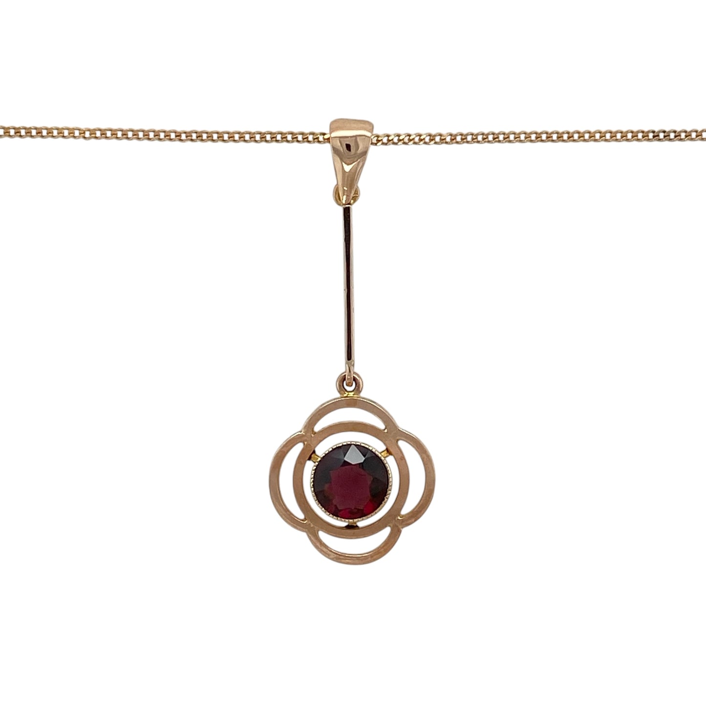 Add romantic vintage-inspired elegance to your jewellery collection with this pre-owned 9ct rose gold ruby flower drop pendant necklace, featuring a beautiful floral design and rich red gemstone centrepiece.

Design: The necklace showcases an elegant vintage-style flower drop pendant set with a striking round ruby measuring approximately 6mm in diameter.