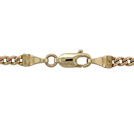 Add timeless versatility to your jewellery collection with this pre-owned 9ct yellow gold 18-inch curb chain, featuring a classic link design suitable for wearing alone or with a pendant.

Design: The chain showcases the traditional curb link style, with interlocking links that lie neatly and comfortably against the neckline.