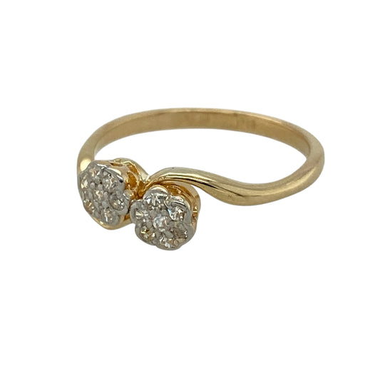 Add distinctive vintage-inspired elegance to your jewellery collection with this pre-owned 18ct yellow gold and platinum diamond double cluster twist ring, featuring an eye-catching design with timeless character.

Design: The ring showcases two sparkling diamond clusters arranged in an elegant twist formation, creating a beautifully balanced design with a distinctive vintage-inspired appearance.