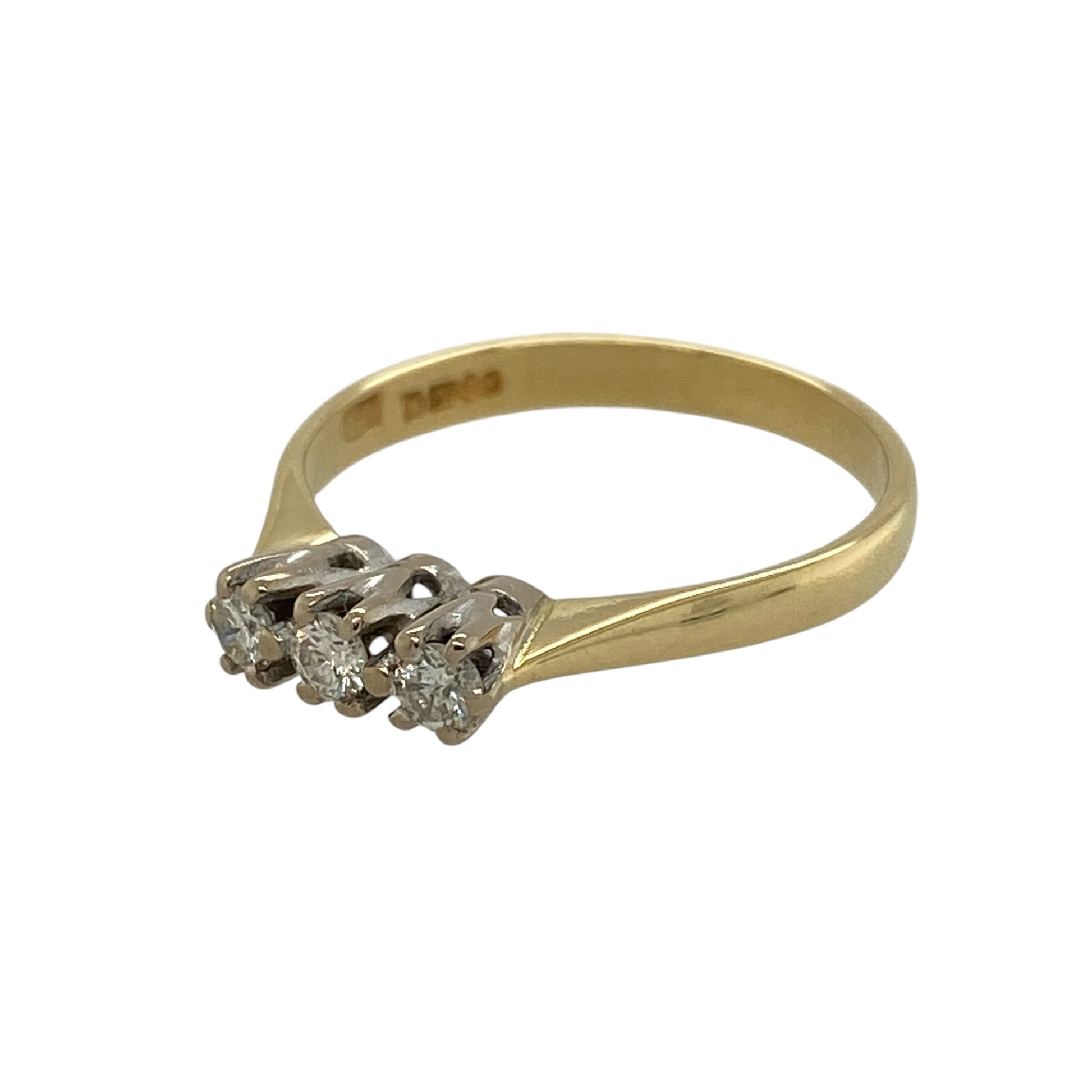 Celebrate timeless elegance and meaningful symbolism with this pre-owned 18ct yellow gold diamond trilogy ring, featuring three sparkling diamonds in a classic design that represents the past, present and future.

Design: The ring showcases three diamonds arranged in a traditional trilogy setting, creating a beautifully balanced display of sparkle and elegance. The timeless three-stone design offers refined styling that is suitable for everyday wear as well as life's most memorable occasions.