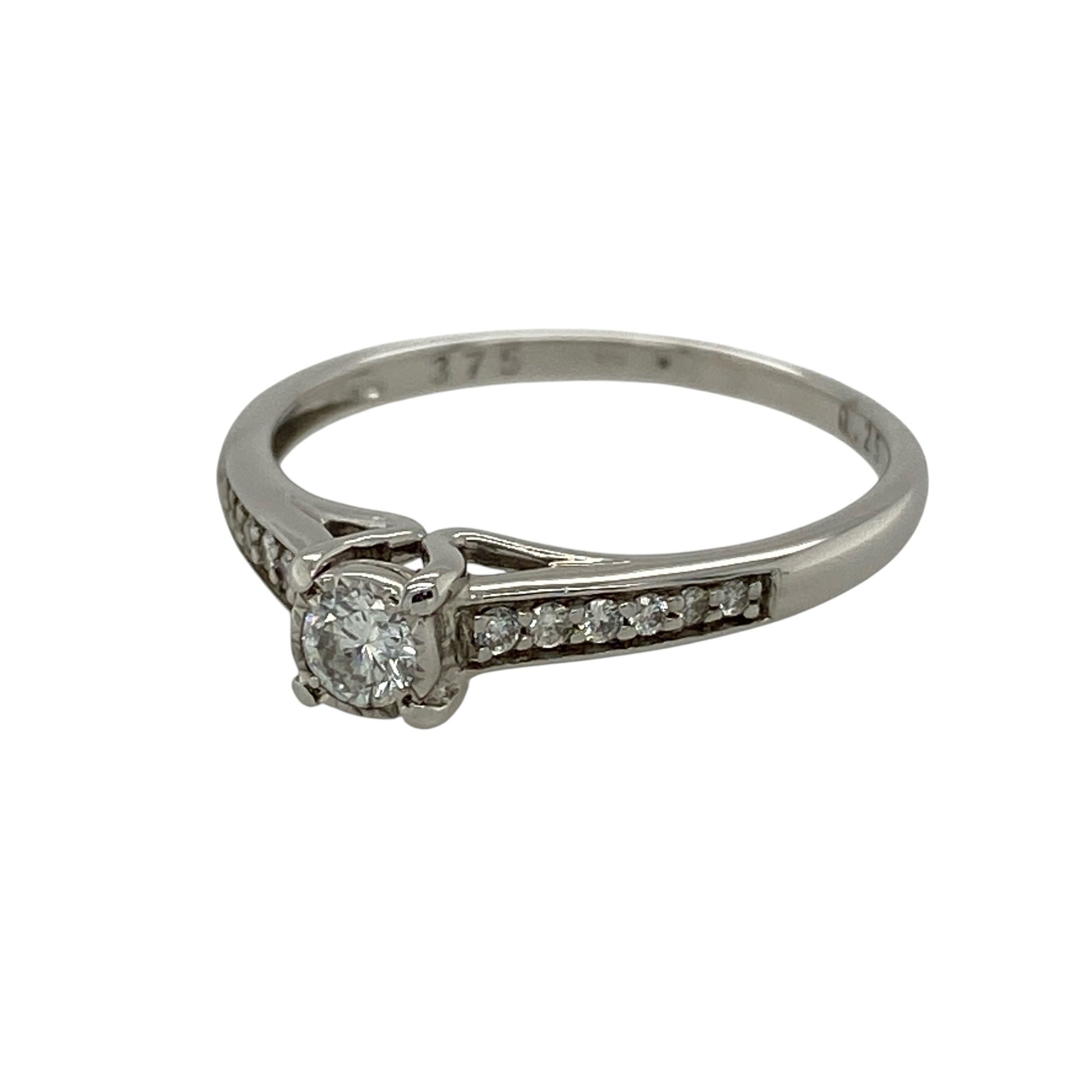Add timeless elegance and brilliant sparkle to your jewellery collection with this pre-owned 9ct white gold diamond solitaire ring, featuring a beautiful brilliant-cut centre diamond enhanced by diamond-set shoulders.

Design: The ring showcases a brilliant-cut centre diamond weighing approximately 0.25ct, creating an elegant focal point with classic sparkle.