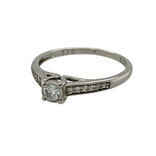 Add timeless elegance and brilliant sparkle to your jewellery collection with this pre-owned 9ct white gold diamond solitaire ring, featuring a beautiful brilliant-cut centre diamond enhanced by diamond-set shoulders.

Design: The ring showcases a brilliant-cut centre diamond weighing approximately 0.25ct, creating an elegant focal point with classic sparkle.