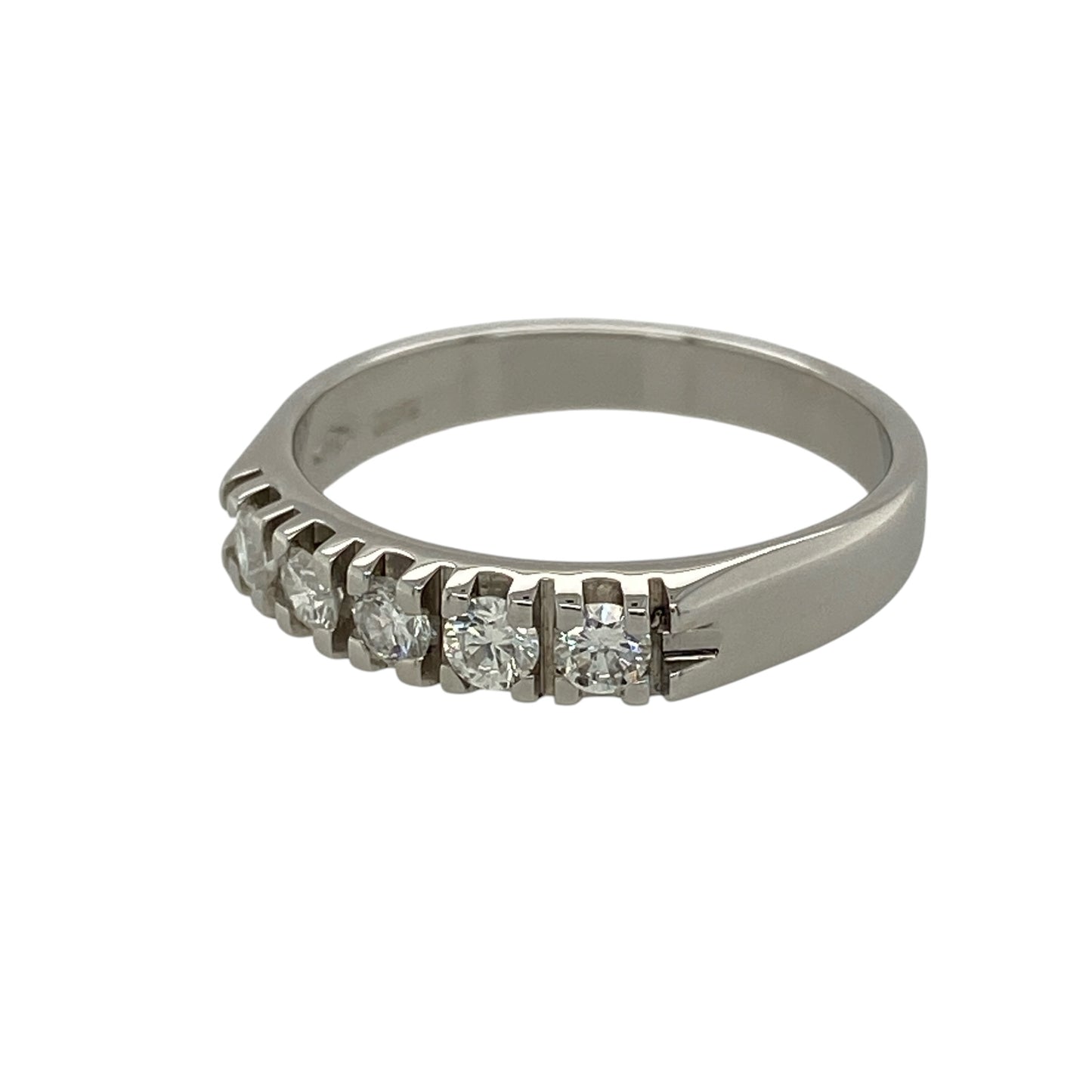 Add timeless sparkle to your fine jewellery collection with this pre-owned 18ct white gold diamond five stone band ring, featuring five diamonds in a classic and elegant setting.

Design: The ring showcases five diamonds arranged across the front of the band, creating a beautifully balanced display of sparkle and sophistication. Measuring approximately 4mm wide across the front, the refined profile makes it suitable for wearing alone, alongside other rings or as an elegant anniversary or milestone piece.