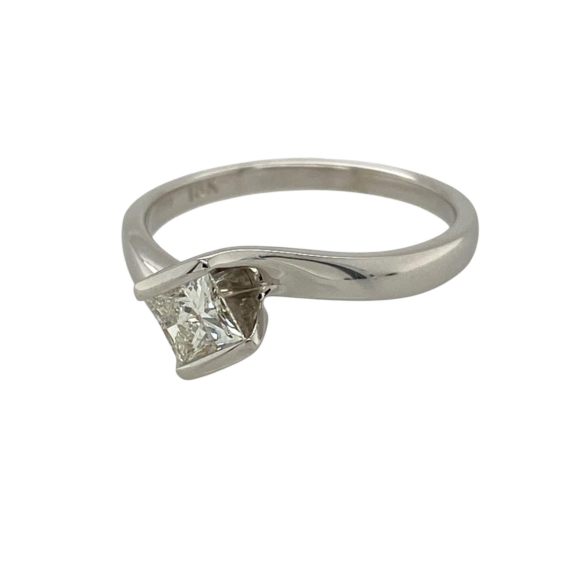 Add contemporary elegance and distinctive sparkle to your fine jewellery collection with this pre-owned 18ct white gold diamond solitaire twist ring, featuring a striking princess-cut diamond in a graceful modern setting.

Design: The ring showcases a beautiful princess-cut diamond weighing approximately 0.39ct, held within an elegant twist-style setting that creates flowing lines around the centre stone.