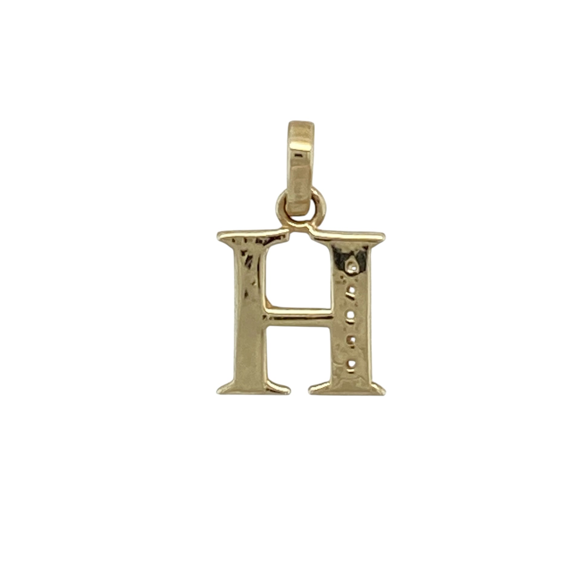 Add a personalised touch of sparkle to your jewellery collection with this pre-owned 9ct yellow gold diamond initial 'H' pendant, featuring a timeless letter design enhanced with elegant diamond detailing.

Design: The pendant showcases the initial 'H' in a classic and stylish design, accented with sparkling diamonds for added brilliance. Its personalised appearance makes it a meaningful piece that can represent a name, loved one or special connection, while remaining versatile enough for everyday wear.