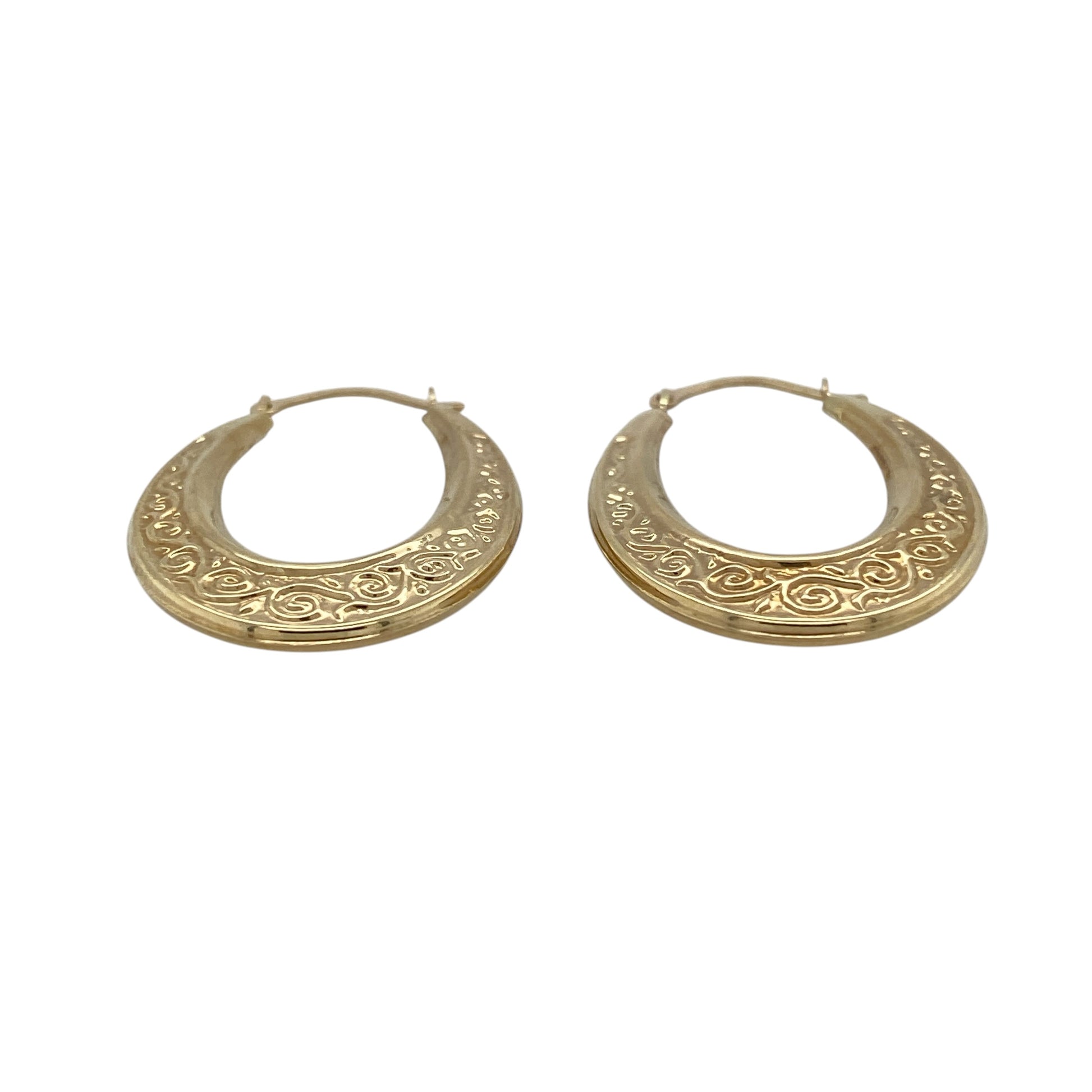 Add elegant detail and timeless style to your jewellery collection with these pre-owned 9ct yellow gold swirl patterned oval creole earrings, featuring a decorative design with classic appeal.

Design: These stylish creole earrings showcase an elegant oval profile enhanced with a decorative swirl pattern, adding texture and visual interest to the traditional hoop design.