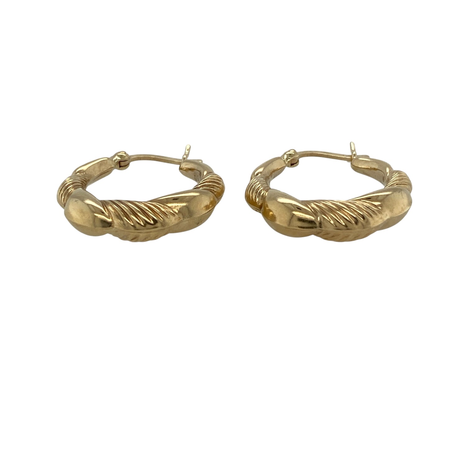 Add timeless style and elegant texture to your jewellery collection with these pre-owned 9ct yellow gold twisted hoop creole earrings, featuring a classic design with distinctive decorative detailing.

Design: These stylish creole earrings showcase a twisted hoop design that adds depth, texture and visual interest to the traditional circular silhouette. The flowing twist detail catches the light beautifully, creating an attractive appearance suitable for everyday wear or special occasions.