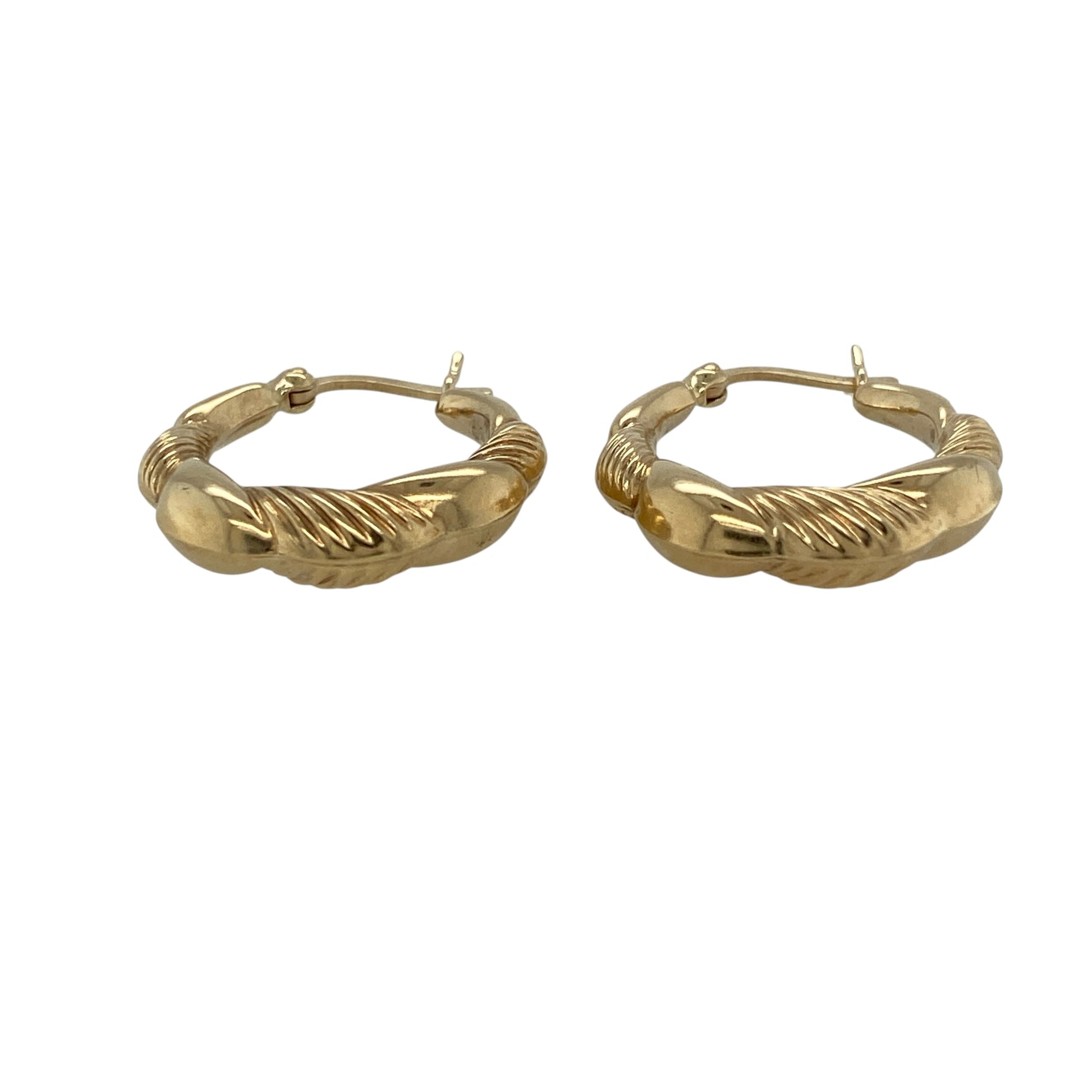 Add timeless style and elegant texture to your jewellery collection with these pre-owned 9ct yellow gold twisted hoop creole earrings, featuring a classic design with distinctive decorative detailing.

Design: These stylish creole earrings showcase a twisted hoop design that adds depth, texture and visual interest to the traditional circular silhouette. The flowing twist detail catches the light beautifully, creating an attractive appearance suitable for everyday wear or special occasions.