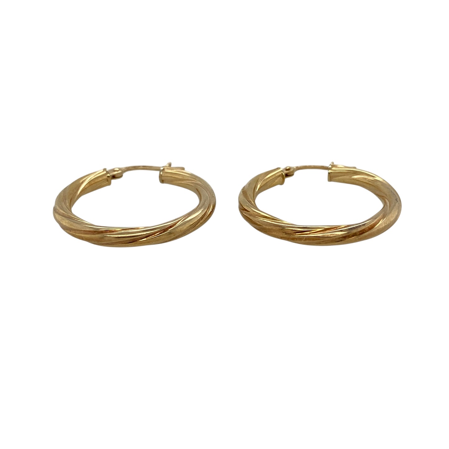 Add timeless style and elegant texture to your jewellery collection with these pre-owned 9ct yellow gold twisted hoop creole earrings, featuring a classic design enhanced by distinctive decorative detailing.

Design: These stylish creole earrings showcase a twisted hoop design that adds depth, texture and visual interest to the traditional circular silhouette.