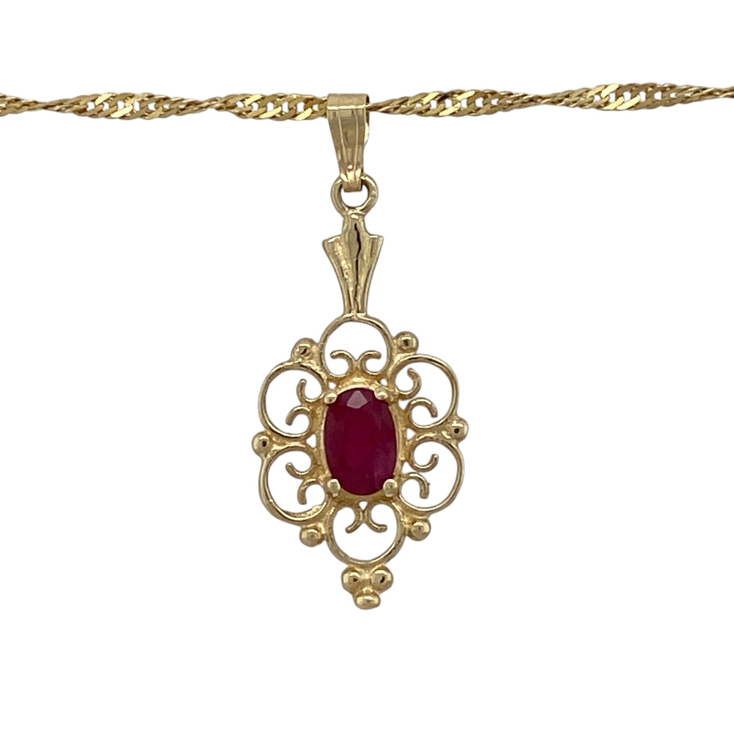 Add vintage-inspired elegance and rich colour to your jewellery collection with this pre-owned 9ct yellow gold ruby filigree-style oval pendant necklace, complete with an 18-inch Singapore chain.

Design: The necklace showcases an elegant oval pendant featuring intricate filigree-style detailing, creating a delicate and decorative appearance with timeless appeal.