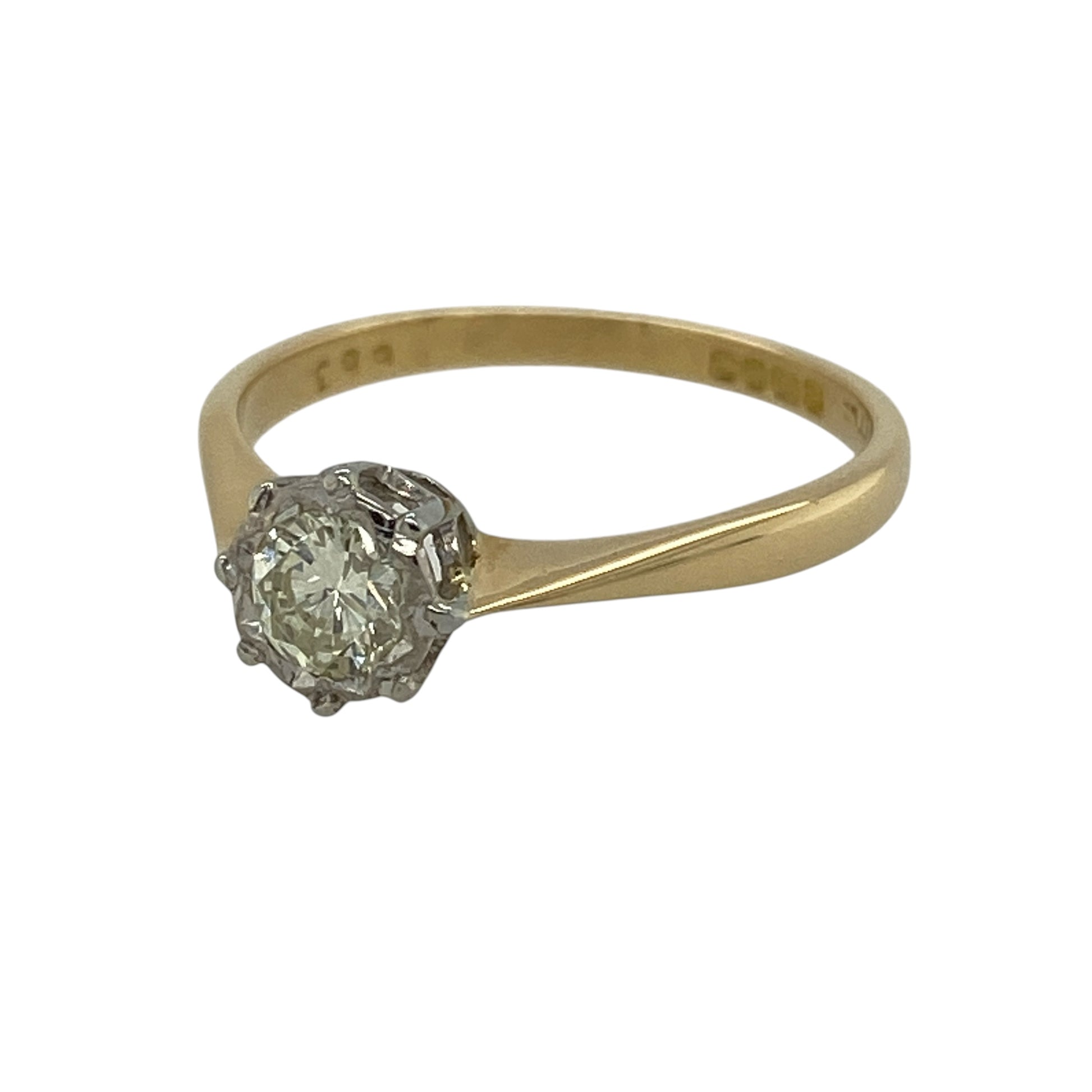 Celebrate timeless elegance with this pre-owned 18ct yellow gold diamond illusion set solitaire ring, featuring a classic design that beautifully enhances the brilliance of its centre diamond.

Design: The ring showcases a single brilliant-cut diamond in an illusion setting, designed to maximise the visual impact and sparkle of the centre stone. Its classic solitaire styling offers enduring appeal, making it a perfect choice for an engagement ring, anniversary gift or elegant everyday wear.